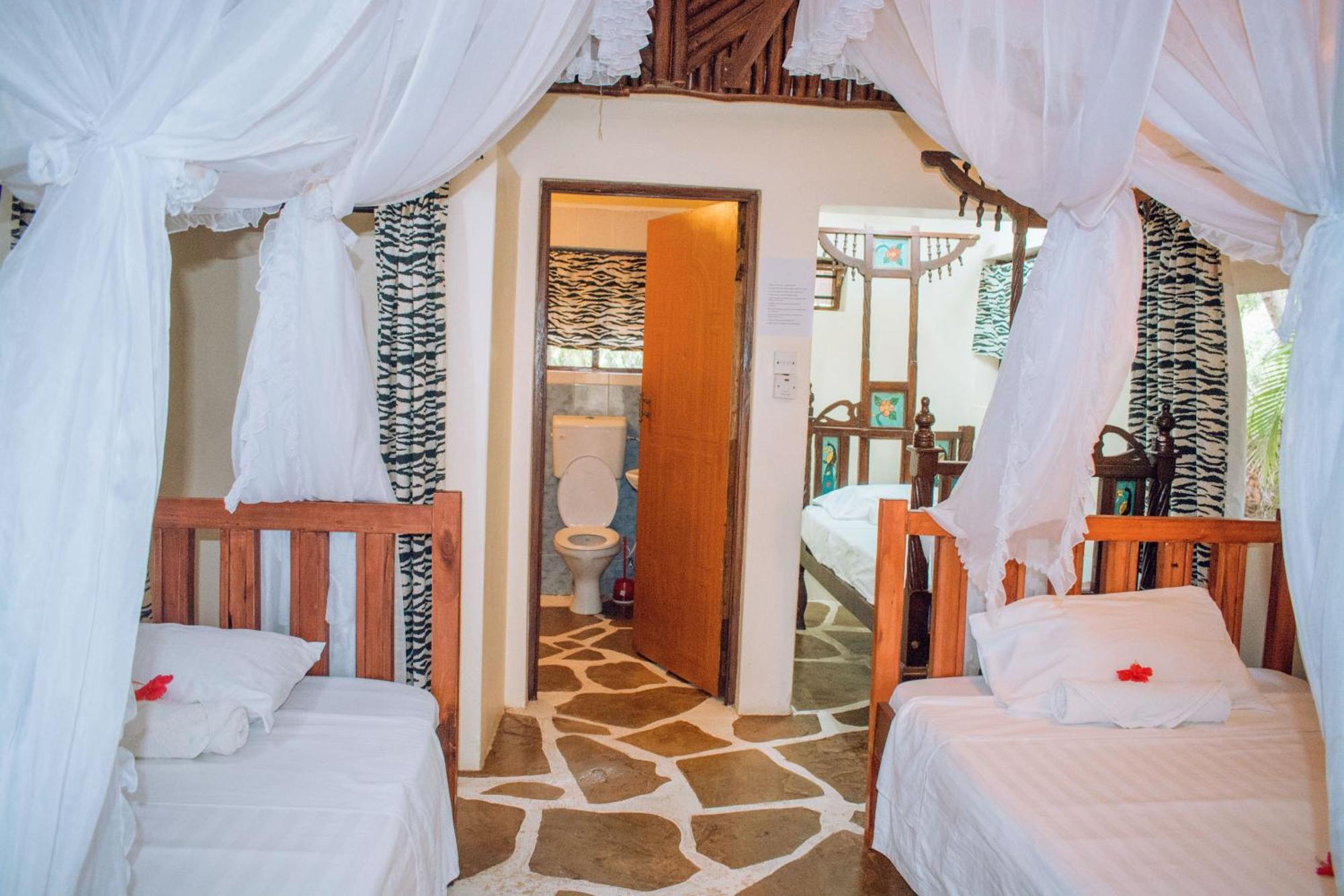 شاطئ دياني Kijani Cottages In Diani المظهر الخارجي الصورة