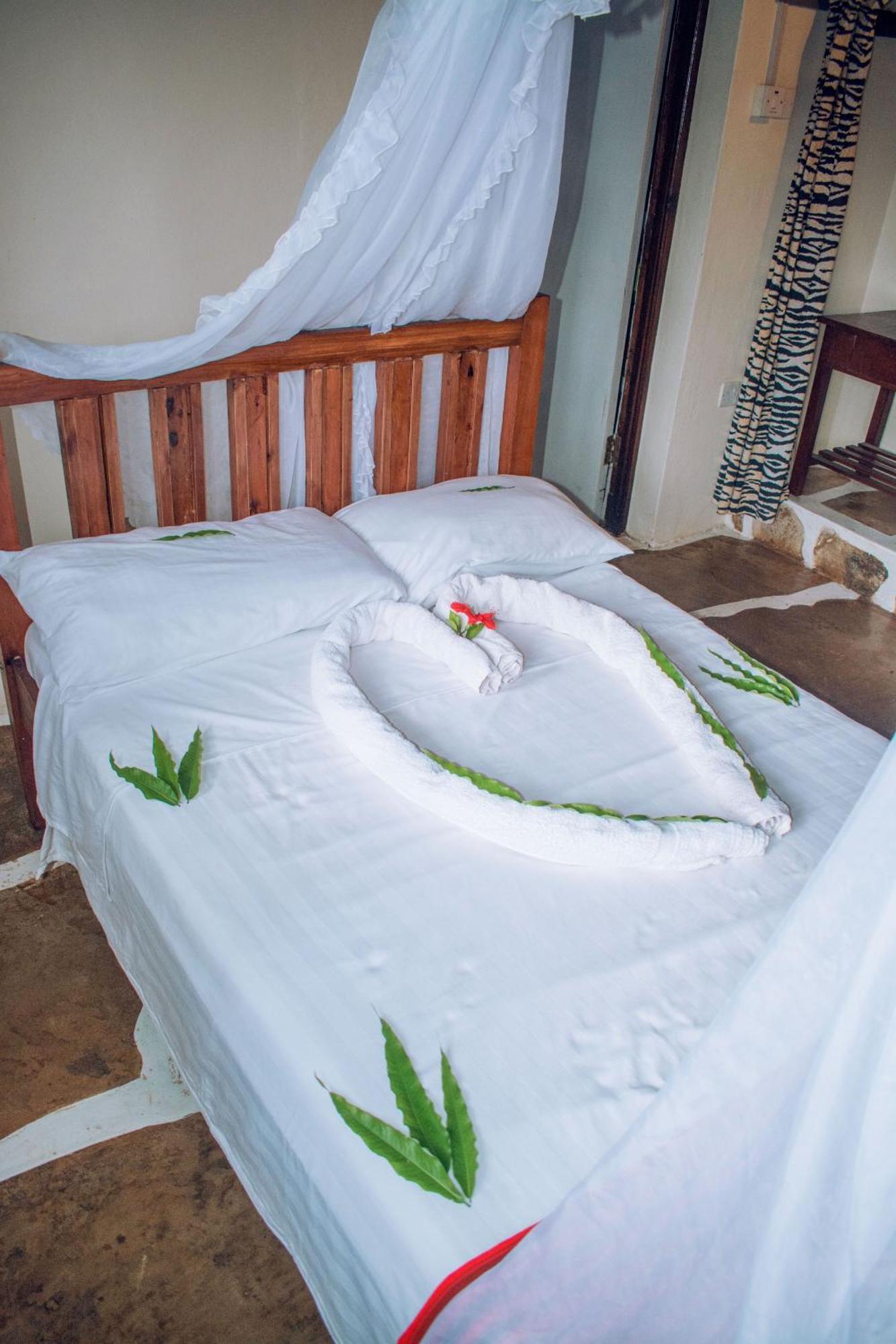 شاطئ دياني Kijani Cottages In Diani المظهر الخارجي الصورة