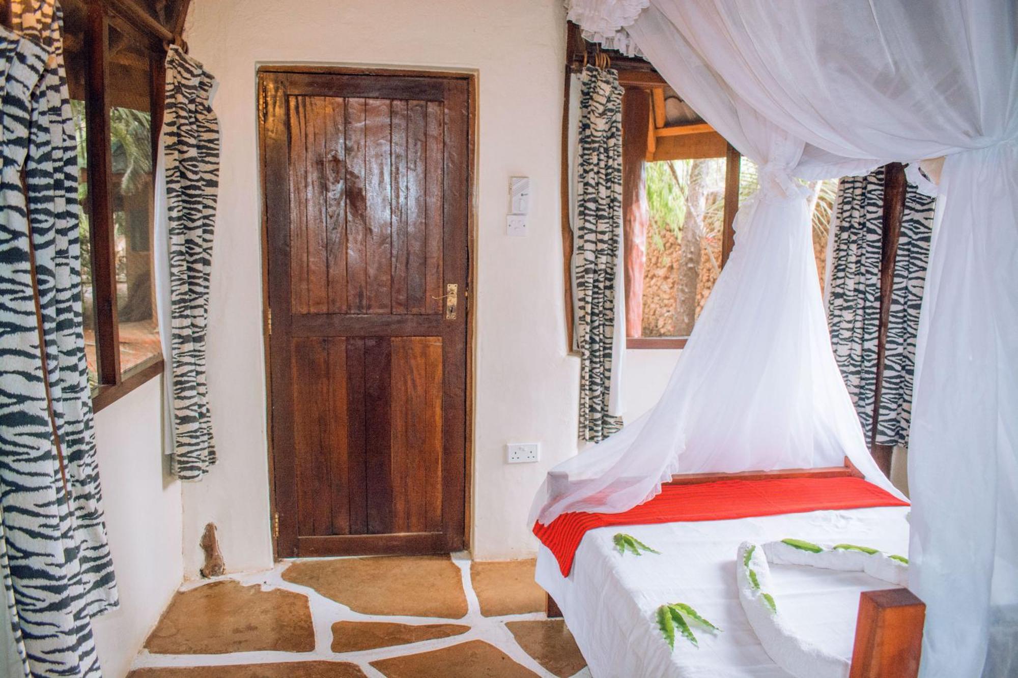 شاطئ دياني Kijani Cottages In Diani المظهر الخارجي الصورة