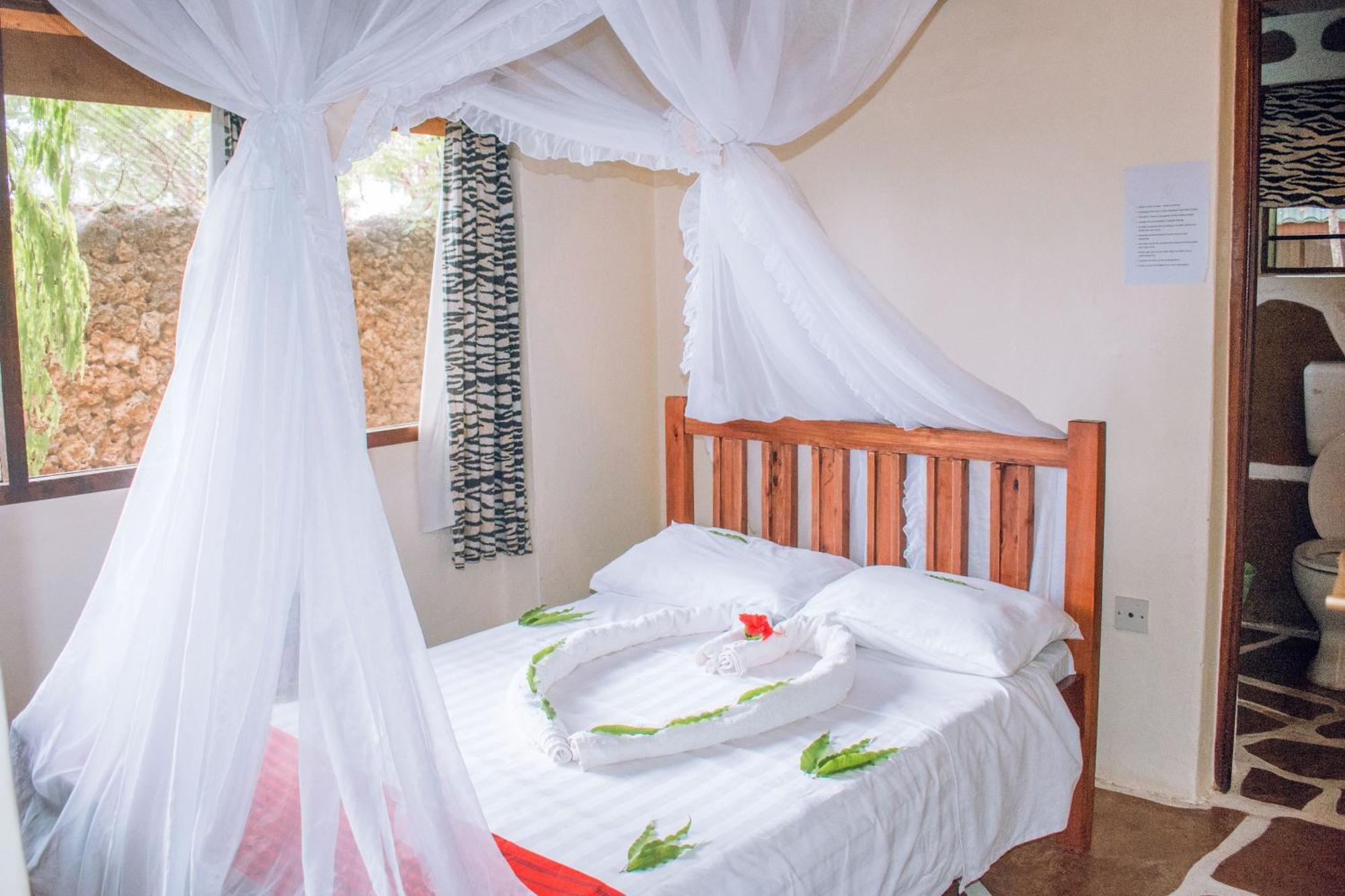 شاطئ دياني Kijani Cottages In Diani المظهر الخارجي الصورة